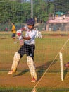 Unidentified boy practicing batting to improve cricketing skills at Mumbai ground Royalty Free Stock Photo