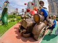 Unidentified boys play with car playground equipment