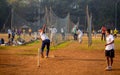 Unidentified boys practicing batting & bowling to improve cricketing skills at Mumbai ground Royalty Free Stock Photo