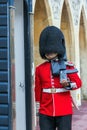 Unidentified British Queen's Guard marching on duty inside Windsor Castle