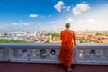 Unidentified buddhist monks in City view point at Golden moutain Temple