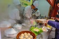 Unidentified Chinese Chef Cook and trade traditional food at Yuyuan Garden in Old City area in Shanghai