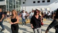 Unidentified citizens dancing traditional Israeli dances on Tel Aviv Promenade