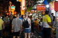 Unidentified couple of tourist at Yaowarat street food night market thailand. Royalty Free Stock Photo