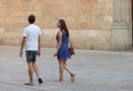 Unidentified couple walking on the street