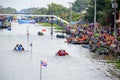 Unidentified crew in traditional Thai long boats compete during Country cup. Traditional Long
