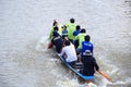 Unidentified crew in traditional Thai long boats compete during Country cup. Traditional Long