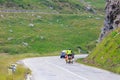 Unidentified cuple of cyclists going to road in Fagaras Mountain, Romania