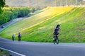 Unidentified cyclist cycling uphill