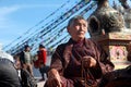 An unidentified devotee offer prays at the Buddhist pilgrimage center Boudhanath Stupa