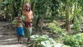 Unidentified Ethiopian girls walking in their village