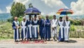 Unidentified Ethiopian tennagers collecting donation for religion on road sideway