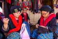 Unidentified female Mien hilltribe embroider pattern colored thread at Doi Mae Salong