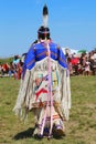 Unidentified female Native American dancer wears traditional Pow Wow dress during the NYC Pow Wow