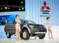 Unidentified females presenter at Mitsubishi booth