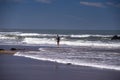 Surf fishing on Atlantic ocean coastline Adraga Beach