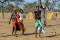 Unidentified Fulani people go back to the village. Fulanis (Peu