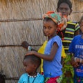 Unidentified Fulani people locate near the shack in the village