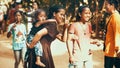 Unidentified girls with children of Cambodian smile