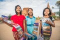 An unidentified girls sells postcard in old Bagan archaeology zone.