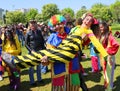 Unidentified Happy Clown holding Girl Clown and posing at Orange Blossom Carnival