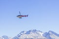 Unidentified helicopter flying over the amazing West Coast, South Island, New Zealand Royalty Free Stock Photo