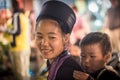 Unidentified Hmong Girl Carrying Baby in Sapa, Lao Cai,Vietnam