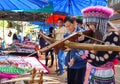 Unidentified Hmong young girl aiming Crossbow