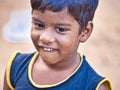 Unidentified indian dalit shy cute boy in the street. Children of Tamil Nadu suffer of poverty Royalty Free Stock Photo