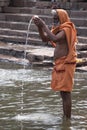 An unidentified Indian hindu man worship River Ganga at Varanasi Stock Photo