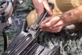 Unidentified israeli soldier hand with fragment of weapon