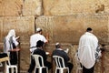 Unidentified jewish men are praying at the Wailing wall (Western wall)