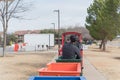 Kid trackless train ride in public winter event in Irving, Texas