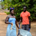 Unidentified local man pulls a cart in a village of the Soga is