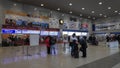 Unidentified male buys ticket from train counter at Kansai Airport Station in Osaka Japan Royalty Free Stock Photo