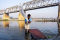 Unidentified man doing a laundry at Dhobi Ghat