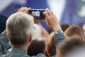 Unidentified man filming scene by mobile phone during a concert dedicated Moscow city day on September 9, 2019 Royalty Free Stock Photo