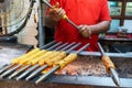 Unidentified Man grilling an Indian Chicken and Mutton Kebabs at Chandni Chowk