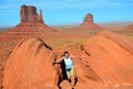 Unidentified man posing in between two red rocks Royalty Free Stock Photo