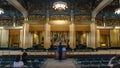 Unidentified man praying inside the Tsukiji Honganji Jodo Shinshu Buddhist temple, Tokyo, Japan Royalty Free Stock Photo