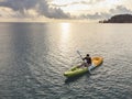 Unidentified man on sea Kayaker Aerial View during sunset. Royalty Free Stock Photo