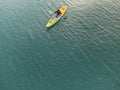 Unidentified man on sea Kayaker Aerial View during sunset. Royalty Free Stock Photo