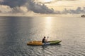 Unidentified man on sea Kayaker Aerial View during sunset. Royalty Free Stock Photo