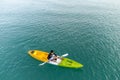 Unidentified man on sea Kayaker Aerial View during sunset. Royalty Free Stock Photo