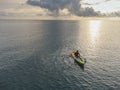 Unidentified man on sea Kayaker Aerial View during sunset. Royalty Free Stock Photo