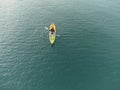 Unidentified man on sea Kayaker Aerial View during sunset. Royalty Free Stock Photo