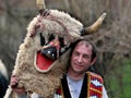 Unidentified man in traditional Kukeri costume is seen at the Festival of the Masquerade Games Kukerlandia in Yambol, Bulgaria Royalty Free Stock Photo