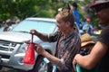 Unidentified man with water gun for celebrating Songkran Royalty Free Stock Photo