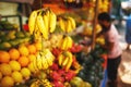 Unidentified man woman at his fruit and or vegetables shop in the main market of the city, in south of India, Asia Royalty Free Stock Photo