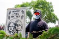 Unidentified Masked Protestor Hollding White Lives Matter Banner at Hudson Pride